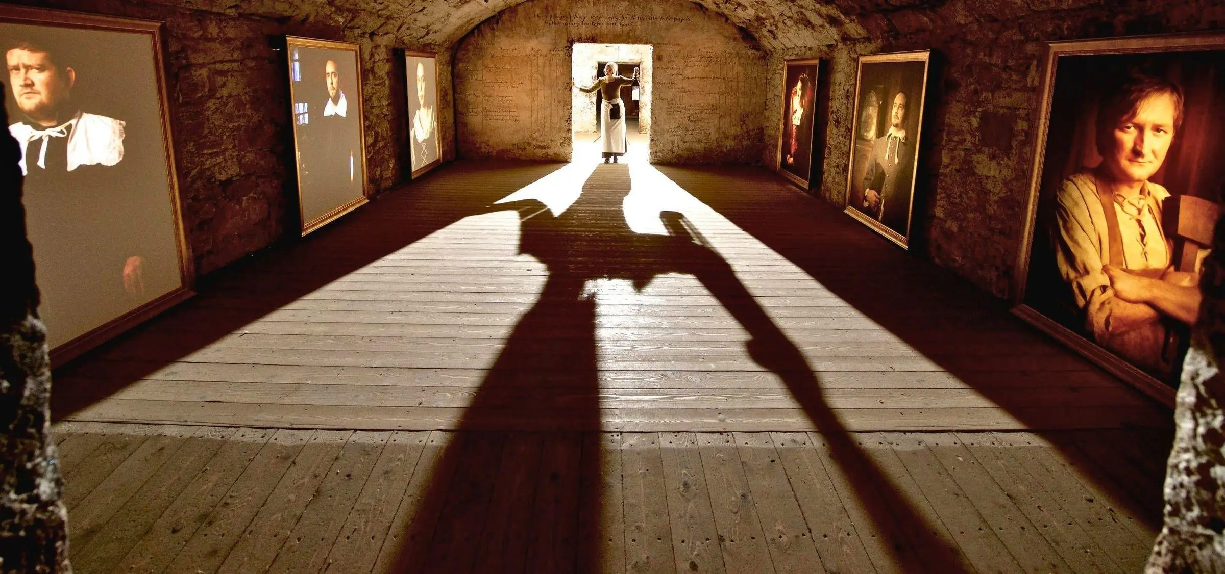 A dimly lit 17th-century underground street in Edinburgh